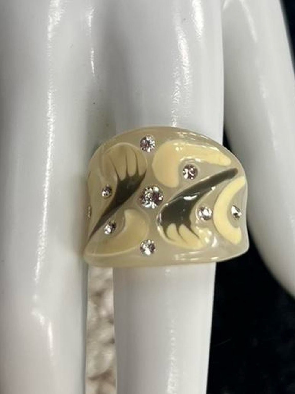 Cream Resin ring with swirls and rhinestone Accents